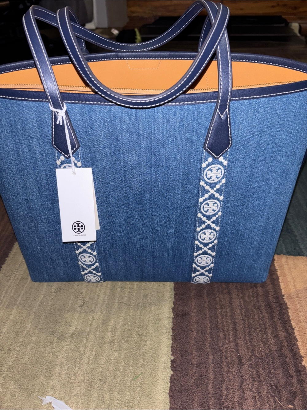 Tory Burch Denim Tote with Navy Trim and Orange Interior - Picture 3 of 10